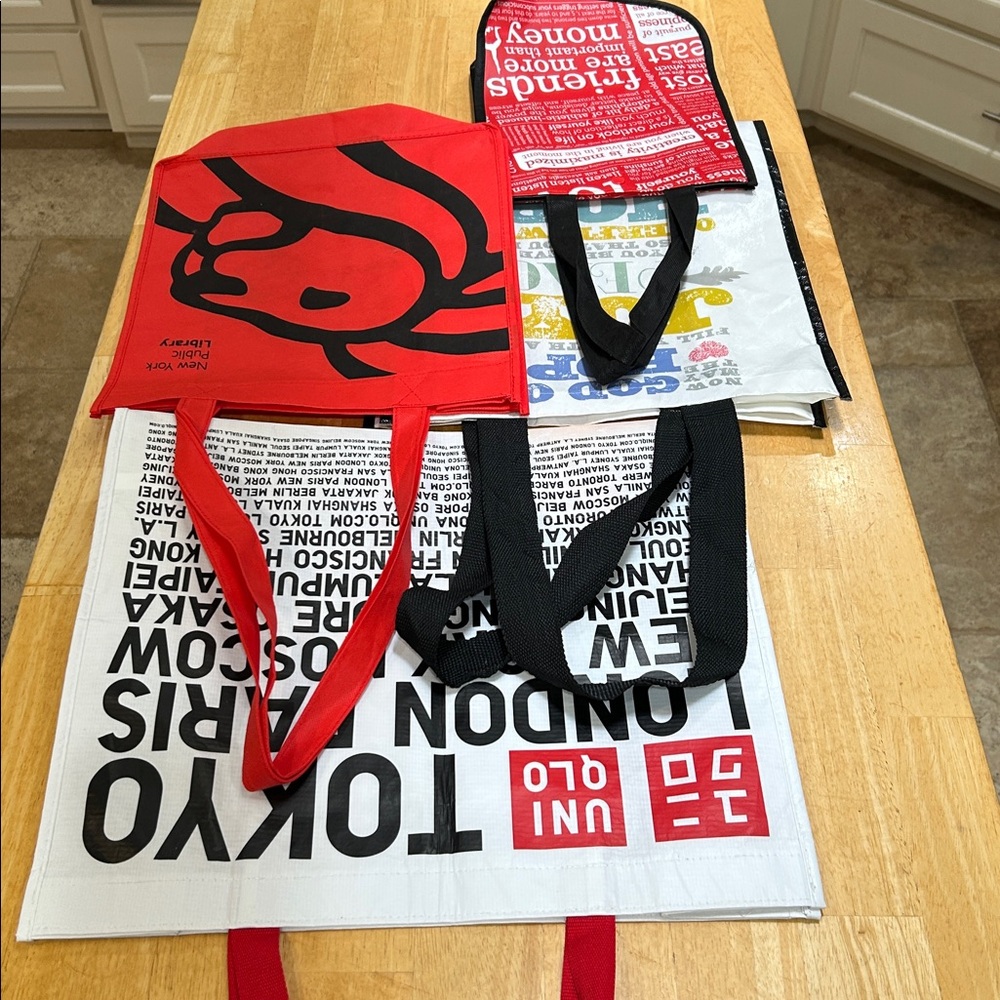 Bundle of 4 bags, Uniqlo Red & Black Graphic Tote Collection. New like condition